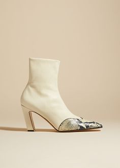 The Dallas Stretch Ankle Boot in Bone with Natural Python-Embossed Lea– KHAITE Ankle Stretches, Urban Cowboy, High Ankle Boots, How To Stretch Boots, Cowboy Boot, Footwear Design Women, Boot Shop, Nappa Leather, Scales