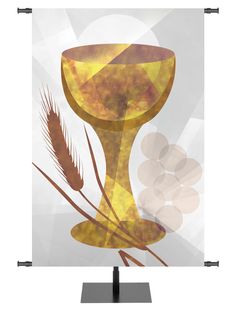 an abstract photo of a golden cup and wheat on a white background with black frame