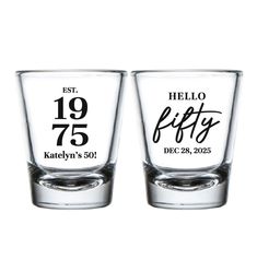 two shot glasses with the words hello kitty and hello kitty written on them, both in black