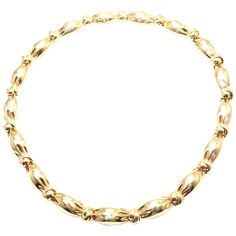 18k Yellow Gold Knotted Link Chocker Necklace by Van Cleef & Arpels. Details: Length: 15.25" Width: 8mm Weight: 79.9 grams Stamped Hallmarks: VCA 750 OXXX.XXXX (serial number omitted) 31 *Free Shipping within the United States* Your Price: $14,500 T2620ahed Luxury Adjustable Yellow Gold Choker, Luxury Elegant Yellow Gold Choker, Formal Oval Link Necklace, Hallmarked, Formal Oval Link Necklace Hallmarked, Formal Oval Link Hallmarked Necklace, Formal Hallmarked Oval Link Necklace, Vintage Choker Necklace, Gold Link Necklace, Diamond Choker Necklace