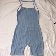 Jumpsuit Romper Pretty Blue Color Size Medium Never Worn Open Back Blue Cotton Bodysuit For Loungewear, Summer Loungewear Overall Bodysuit, Blue Stretch Casual Jumpsuits And Rompers, Casual Blue Stretch Jumpsuits And Rompers, Blue Sleeveless Cotton Bodysuit, Casual Blue Cotton Bodysuit, Casual Light Blue Sleeveless Bodysuit, Light Blue Fitted Jumpsuits And Rompers For Summer, Light Blue Fitted Summer Jumpsuits And Rompers