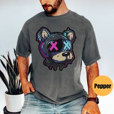 Dog Graphic Tee | Graffiti Dog Shirt | Graphic Tee For Him | Gift For Dog Lover |  Comfort Colors Graphic Tee | Punk Graphic Shirt  Matching Sweatshirt: https://printworkshopcompany.etsy.com/listing/1745486389/dog-graphic-sweatshirt-graffiti-dog ** HOW TO ORDER 1. Check our photos for sizing and color options.  2. Select your size and color from the drop-down menus.  3. Click "ADD TO CART" to add the shirt to your cart. 4. Click "PROCEED TO CHECKOUT" to purchase your shirt. ** VIP Email List Be Punk Style Cotton T-shirt With Cartoon Print, Punk Style Short Sleeve Tops With Cartoon Print, Crew Neck Shirt With Cartoon Print For Streetwear, Punk Cotton Tops With Cartoon Print, Punk Style Cotton Tops With Cartoon Print, Trendy Cartoon Print Shirt For Streetwear, Punk Style T-shirt With Cartoon Print For Streetwear, Black Punk T-shirt With Cartoon Print, Punk Style Crew Neck Top With Cartoon Print