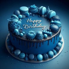 a birthday cake with blue frosting and decorations