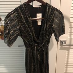 Beautiful Black Dress With Gold Shimmer Throughout . Some Parts Are Sheer Adding A Sexy Touch. Knot At Waist. Lined. Approx 17” Pit To Pit; 48” Shoulder To Bottom V-neck Midi Dress For Holiday Party, Black V-neck Dress For Holiday Party, Short Sleeve Mini Dress For Night Out Holiday, Chic Short Sleeve Mini Dress For Holiday, Holiday Chic Mini Dress With Short Sleeves, Chic Short Sleeve Holiday Mini Dress, Teal Mini Dress, Beautiful Black Dress, Shimmery Dress