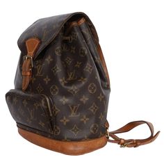 Authentic Louis Vuitton Brown Monogram Montsouris Backpack Mm (Medium size). Features monogram canvas with leather trim, front zippered pouch, top string closure with buckle front flap, the interior has a brown textile lining with slip pocket, adjustable shoulder straps. This bag is perfect for shopping, travel, school, and hands-free needs. Unisex bag! Authenticity Date Code: SP0024 Made in France Strap Drop: (adjustable) Classic Travel Backpack In Monogram Canvas, Classic Monogram Canvas Travel Backpack, Classic Brown Monogram Canvas Backpack, Brown Monogram Canvas Backpack, Montsouris Backpack, Pre Owned Louis Vuitton, Louis Vuitton Brown, Zippered Pouch, Bag Packaging