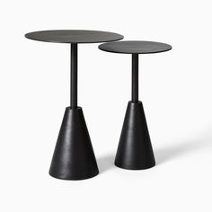 two tables with black bases on each side