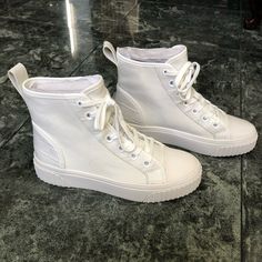 Michael Kors “Gertie” High Top Women’s Sneakers.White, Size 6.Worn Only Once. No Original Box Round Toe Boots With Laces And White Sole, White Casual Boots With Rubber Sole, Casual White Boots With Rubber Sole, Spring High-top Sneakers With Textured Sole And Round Toe, High-top Sneakers With White Laces, Spring Ankle-high High-top Sneakers With White Sole, White High-top Flat Heel Sneakers For Spring, White High-top Sneakers With Flat Heel For Spring, White Flat High-top Sneakers For Spring