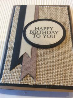 a happy birthday to you card with a ribbon around the edge and a tag on it