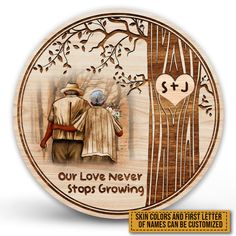 a wooden plaque with the words our love never stops growing and an image of two people hugging