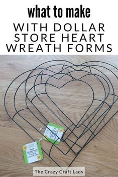 a heart shaped wire basket with two tags attached to it and the words, what to make with dollar store heart wreaths