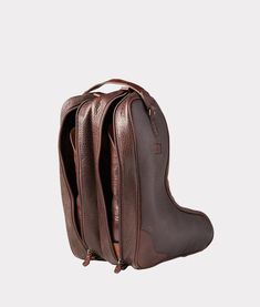 Luxury and style merged into one. The pebbled Cowhide Leather Boot Bag will safely get your boots from one function to the next in major fashion. Big enough for your favorite pair of boots, but compact enough to travel alongside you wherever the next adventure takes you. Boot Bag, Cowhide Leather, Leather Boots, Handbags, Boots, Leather