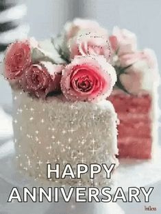 a happy anniversary card with pink roses in a cake