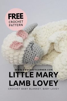 a crocheted lamb laying on top of a blanket with the text free pattern