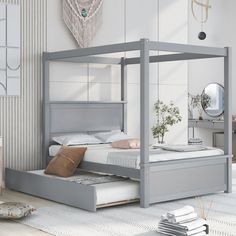 a bedroom with a bed, dresser and mirror on the wall next to each other