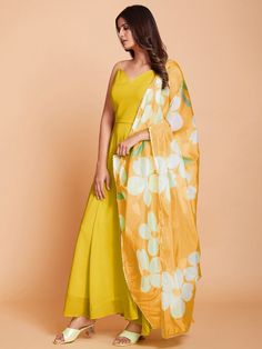 Hello, gorgeous ladies! Are you getting ready for that special Haldi ceremony? We have our stunning yellow gown just waiting for you. This lovely radiant ode to sunshine is all a girl needs to look royal and stunning all at once.
Accompanied by a dupatta digitally printed with an intricate design, this ensemble is simply perfect for your Haldi occasion or any festivity. The vibrant yellow color symbolizes joy and positivity, making you stand out in the crowd.
Available in ready-made sizes stretc Haldi Gown, Plain Anarkali, Gown Anarkali, Georgette Anarkali, Gown With Dupatta, Yellow Gown, Net Blouses, Salwar Dress, Anarkali Kurti