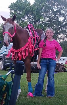 Fringe breast collar in hot pink and is made from mule tape. This is a hand braided fringe breast collar. It fits an average size horse and is very adjustable. The side tugs hook to the saddle with trigger snaps.To clean wash in a mildSoap and water and hang to dry. Fringe breast collar adjustable mule tape Tripping Collar, Barrel Reins, Leather Spur Straps, Collar Macrame, Apple Watch Bands Fashion, Braided Fringe, Wither Strap, Bitless Bridle, Pink Mules