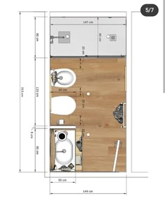 the floor plan for a small bathroom with toilet, sink and bidet in it