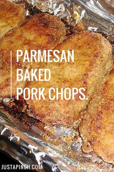 baked pork chops sitting on top of foil in a pan with the words parmesan baked pork chops