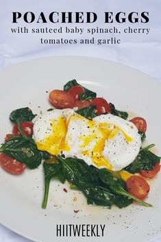 poached eggs with sauteed baby spinach, cherry tomatoes and garlic