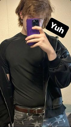 a person taking a selfie in front of a mirror with the words buy on it