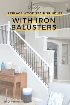 a living room filled with furniture and a stair case next to a staircase banister