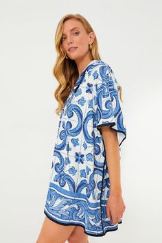 Designed by our Tuckernuck founders, Tnuck Beach fulfills a need for elevated caftans that can be worn from the beach to the brewery to that everlasting sunset barbecue. Like your favorite summer days that turn into nights, these pieces are easy and effortless!A beach towel-esque number that's perfect for throwing on after a long day in the sun? Sign us up! The Majolica Terrycloth Coverup screams unfussy dressing with it's relaxed fit, drawstring hood, and kangaroo pocket to hold your essentials Vacation Tunic With Relaxed Fit And Short Sleeves, Short Sleeve Relaxed Fit Tunic For Vacation, Relaxed Fit Short Sleeve Tunic For Vacation, Blue Summer Tunic For Beach Season, Blue Summer Tunic For Beach Cover-up, Blue Tunic For Summer Beach Cover-up, Blue Summer Beach Cover-up Tunic, Summer Vacation Tunic With Relaxed Fit, Summer Vacation Relaxed Fit Tunic