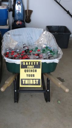 a wheelbarrow filled with lots of soda bottles