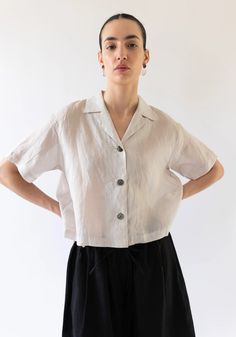 Sayaka Davis Sheer Cropped Shirt in Sand – VESTIGE Summer Blouse With Johnny Collar In Relaxed Fit, Summer Blouse With Johnny Collar And Relaxed Fit, Summer Johnny Collar Blouse With Relaxed Fit, Linen V-neck Shirt With Buttons, Chic Short Sleeve Linen Shirt, Beige Short Sleeve Blouse With Button Closure, Beige Blouse With Button Closure And Short Sleeves, Short Sleeve Linen Blouse With Buttons, Spring Accessories