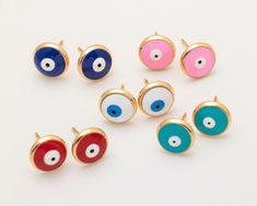 Item Details Measurement: 10mm Material: Brass, CZ, Enamel Post Material : Brass Post Color: 14k gold Tone Quantity: 2Pieces , 6Pieces Country of Origin : South Korea Gold Round Evil Eye Earrings, Round Evil Eye, Devil Eye, Jewelry Dainty, Elephant Charm, Eye Jewelry, Brass Earrings, Evil Eye, Charm Pendant