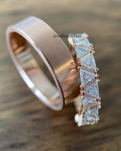 two wedding bands with three princess cut diamonds