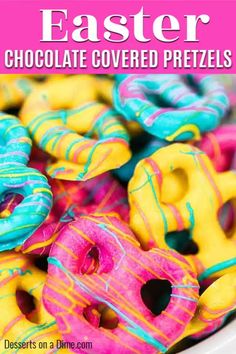 there are many colorful donuts in the bowl on the table with text overlay that says, easter chocolate covered pretzels