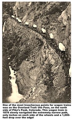 an old black and white photo of a train going over a bridge