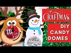 two paper snowmen are standing next to each other with the words christmas diy candy domes