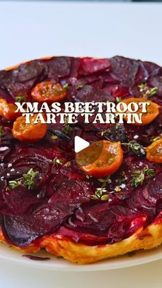 there is a beetroot tarte on a plate with the words xmas betroot tarte tartin