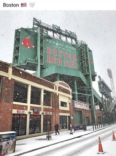 the boston red sox stadium is covered in snow