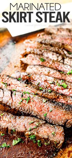 sliced steak on a wooden cutting board with parsley garnish and text overlay that reads marinated skirt steak