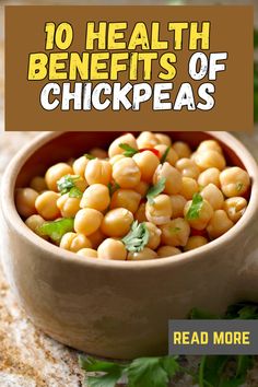 a bowl filled with chickpeas on top of a table