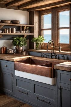 Rustic kitchen with weathered wood cabinets and copper accents Wood Countertops And Cabinets, Distressed Grey Kitchen Cabinets, Moody Kitchen With Oak Cabinets, Rustic Bright Kitchen, Rustic Farmhouse Cabinets, Modern Rustic Kitchen Design Ideas, Cozy Kitchen Cabinets, Rustic Shaker Cabinets Kitchen, Lodge Kitchen Ideas Rustic