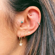 Add a pop of colour to your ear stack with our gorgeous ethically sourced, natural turquoise trilogy huggie. Providing that perfect close fit we are all looking for, this piece is ideal for mini lobes, rook, tragus and helix piercings and we love it! Made with solid 9 karat gold this is a piece you can wear everyday without the fear of it changing colour. Solid 9k GoldThis metal can be worn all day everyday without the fear of it changing colour. It will not tarnish and can be cleaned with warm Tragus Piercing Pain, Flat Back Earrings, Tragus Piercings, Diamond Star, Helix Piercing, Star Studs, Huggie Hoop Earrings, Star Pendant