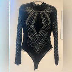 Absolutely Stunning Bodysuit That Is Brand New Without Tags. There Are So Many Ways To Wear This And Make A Statement. I Bought It To Wear Under A Graphic T-Shirt For A Country Concert In Nashville, But Would Also Be Perfect For New Years Eve, Las Vegas, Or Anywhere You Want To Shine Stretchy, Soft, And Sheer. Could Wear A Tank Underneath For More Coverage Or A Cute Bralette For A Sexier Look. Plus Size Friendly. Embellished Long Sleeve Bodysuit For Party, Glamorous Fitted Black Bodysuit, Black Sequin Bodysuit For Party, Glamorous Black Stretch Bodysuit, Elegant Stretch Bodysuit With Sequins, Black Sequined Party Bodysuit, Fitted Embellished Evening Bodysuit, Elegant Embellished Fitted Bodysuit, Glamorous Rhinestone Bodysuit For Night Out