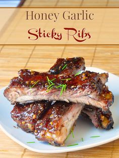 honey garlic sticky ribs on a white plate