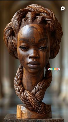 a wooden sculpture of a woman with braids on her head