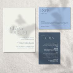 three different business cards on top of each other, one is blue and the other is white