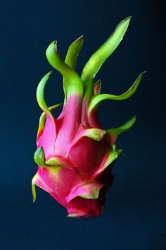 a dragon fruit is shown in the air