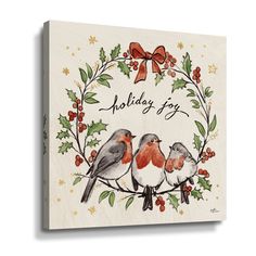 a holiday card with three birds sitting in a wreath on top of holly leaves and berries