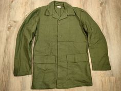 Swedish military jacket. These jackets have two front pockets with flap and button. Closed with buttons. The color may vary slightly depending on the jacket. Dimensions: size: C40 shoulders: 46 cm chest: 53cm length: 75 cm arm length: 59 cm The jacket is new size: C48 shoulders: 48 cm chest: 59cm length: 75 cm arm length: 60 cm The jacket is sewn back and front size: C50 shoulders: 47 cm chest: 61cm length: 76 cm arm length: 61 cm The jacket is sewn back on the right sleeve & there is a stain on Military Style Khaki Utility Jacket With Buttoned Pockets, Double-breasted Khaki Pea Coat With Pockets, Khaki Double-breasted Pea Coat With Pockets, Military Style Outerwear With Lapel Collar And Pockets, Military Style Cotton Utility Jacket With Lapel Collar, Military Utility Jacket With Lapel Collar For Fall, Solid Pea Coat With Pockets And Button-up Design, Solid Color Pea Coat With Pockets And Button-up Style, Solid Button-up Pea Coat With Pockets