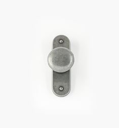 a metal door handle on a white background