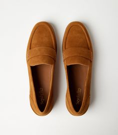 These Penny Loafers offer both comfort and style for your everyday wear. With a low heel and round toe, they are perfect for transitioning from work to a casual day out. These versatile shoes are a must-have addition to your wardrobe. Runs 1/2 big; we recommend next size down Leather Heel height: .75" Soft insole Easy slip on Imported Seychelles | Karen Kane Suede Penny Loafers in Tan, Size 6.5, Plain 75 Soft, Versatile Shoes, Karen Kane, Suede Material, Penny Loafers, Seychelles, Black And Tan, Low Heels, Leather Heels