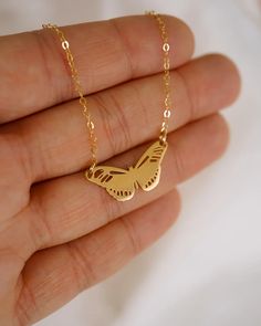 Our Metamorphosis Butterfly Necklace is the perfect accessory to transform any outfit! Crafted with either 18k Gold or Sterling Silver, this customizable necklace features a butterfly design that you can engrave with two initials for a personalized touch. Elevate your style and add a unique, meaningful piece to your collection with this stunning butterfly necklace. Butterfly Garden Necklace Altered State, Butterfly Shaped Stainless Steel Necklace For Gift, Gold Butterfly Engraved Jewelry, Stainless Steel Butterfly Necklace Gift, Butterfly Shaped Necklace With Adjustable Chain For Gift, Sterling Silver Butterfly Necklace With Adjustable Chain, Yellow Gold Butterfly Necklace With Adjustable Chain, Butterfly Shaped Stainless Steel Jewelry For Gifts, Butterfly Charm Jewelry Gift