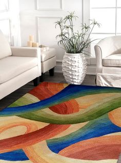 a colorful area rug in a living room